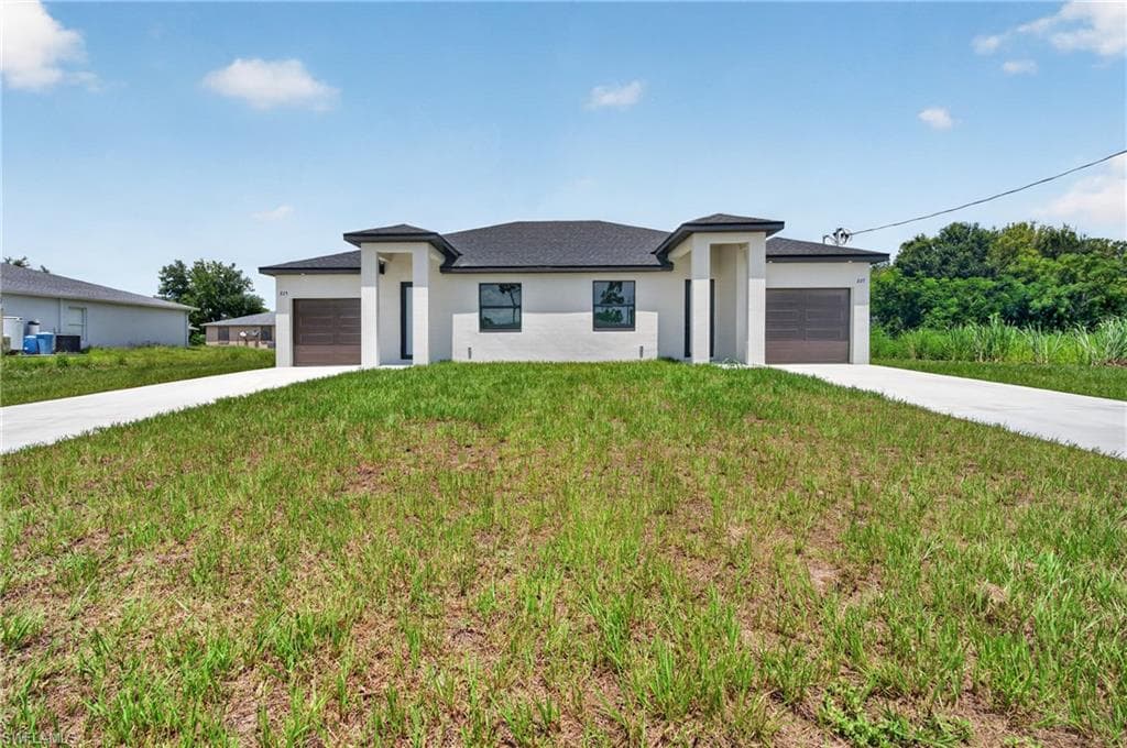 225/227 Ivan AVE S LEHIGH ACRES, FL 33973