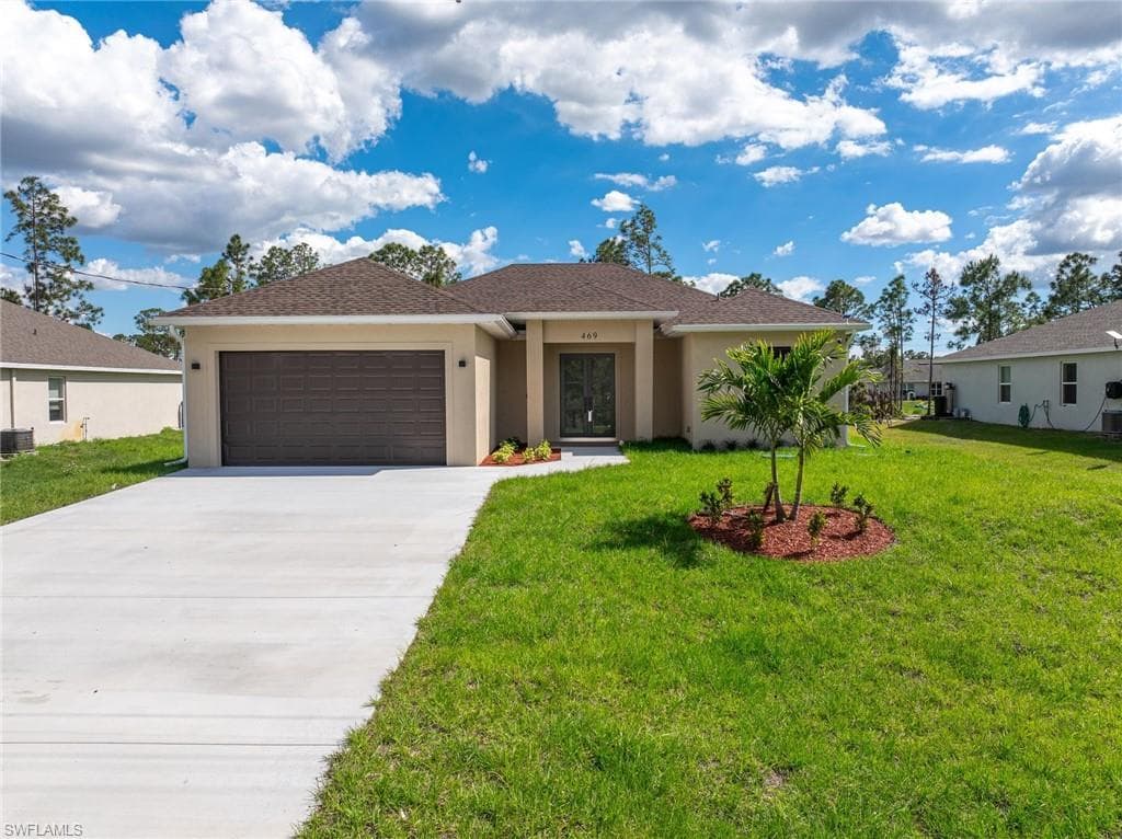 469 Woodman DR LEHIGH ACRES, FL 33972