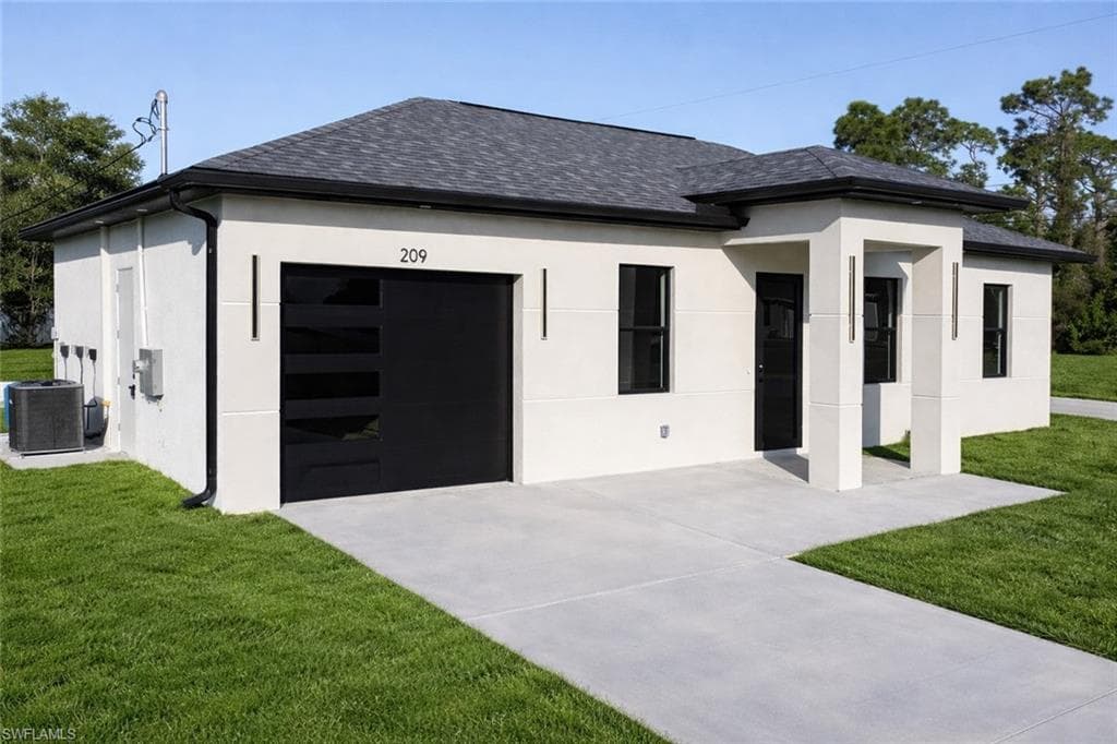 209 Irving AVE N LEHIGH ACRES, FL 33971