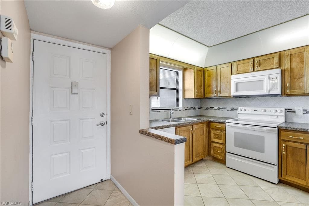 4338 27th CT SW 104 NAPLES, FL 34116