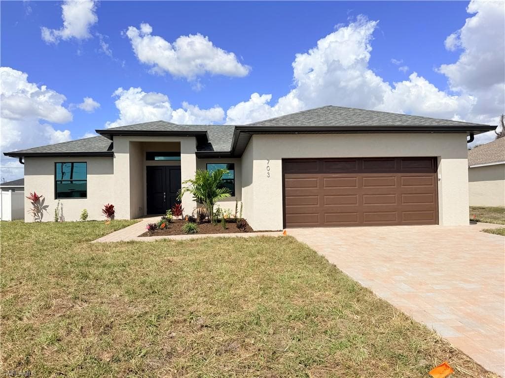 703 NW 1st TER CAPE CORAL, FL 33993