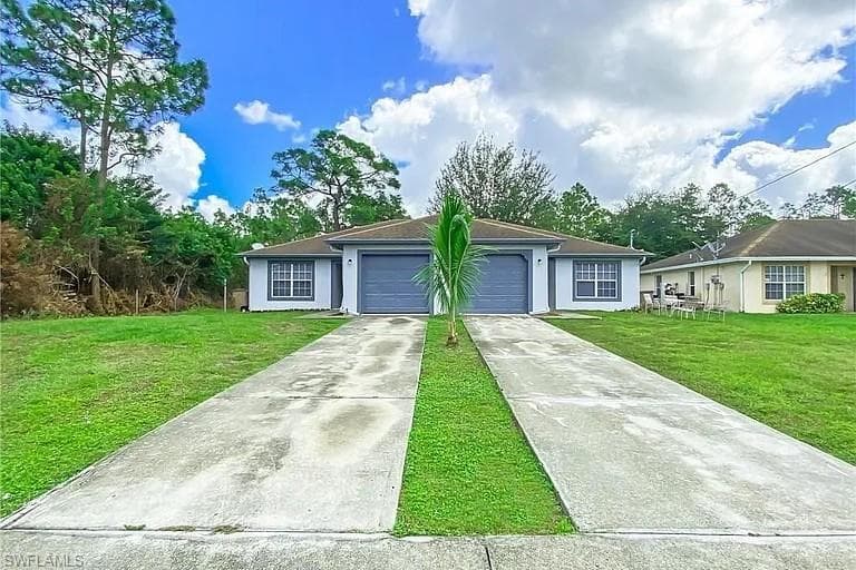 609/611 HAWTHORNE AVE S LEHIGH ACRES, FL 33974