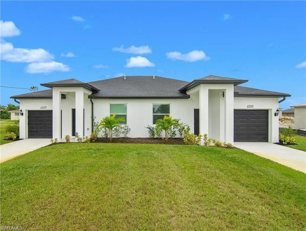 313/315 IVAN AVE S LEHIGH ACRES, FL 33973