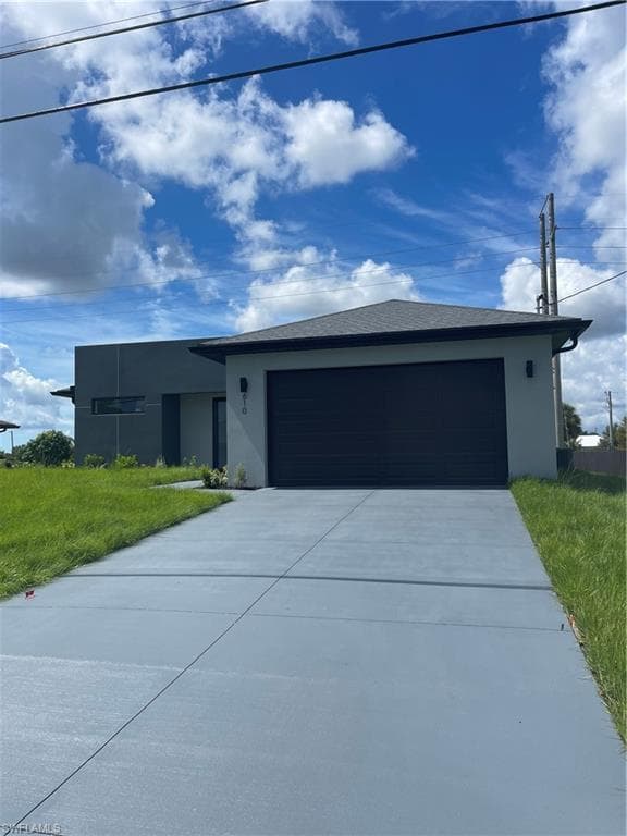 610 FLOYD AVE S LEHIGH ACRES, FL 33976