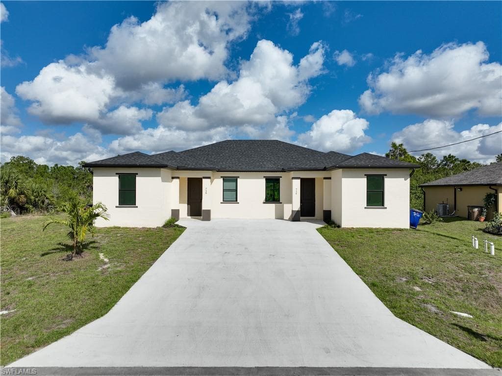 714 W 12th ST LEHIGH ACRES, FL 33972