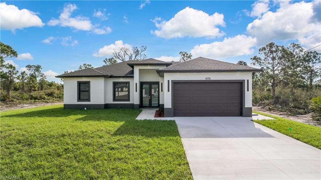 606 Johns AVE LEHIGH ACRES, FL 33972