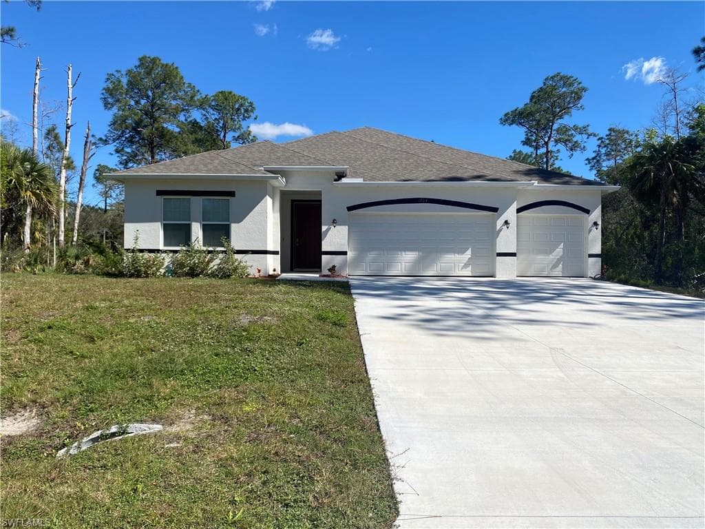 1704 Greenwood AVE LEHIGH ACRES, FL 33972