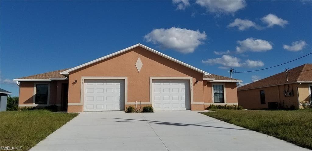 1309/1311 NE 8th PL CAPE CORAL, FL 33909