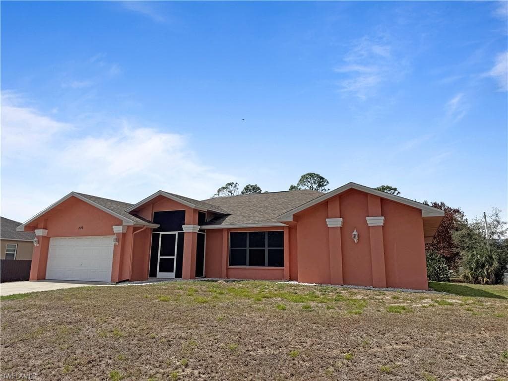 209 McArthur AVE LEHIGH ACRES, FL 33936