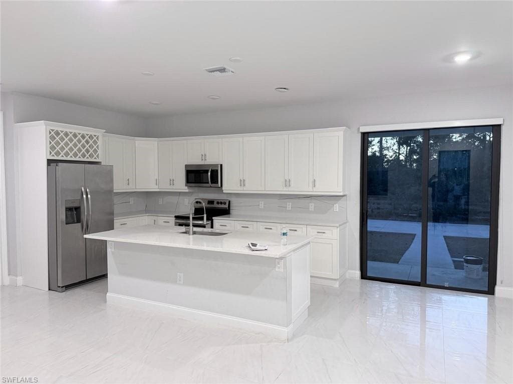 912 Ossie AVE LEHIGH ACRES, FL 33974