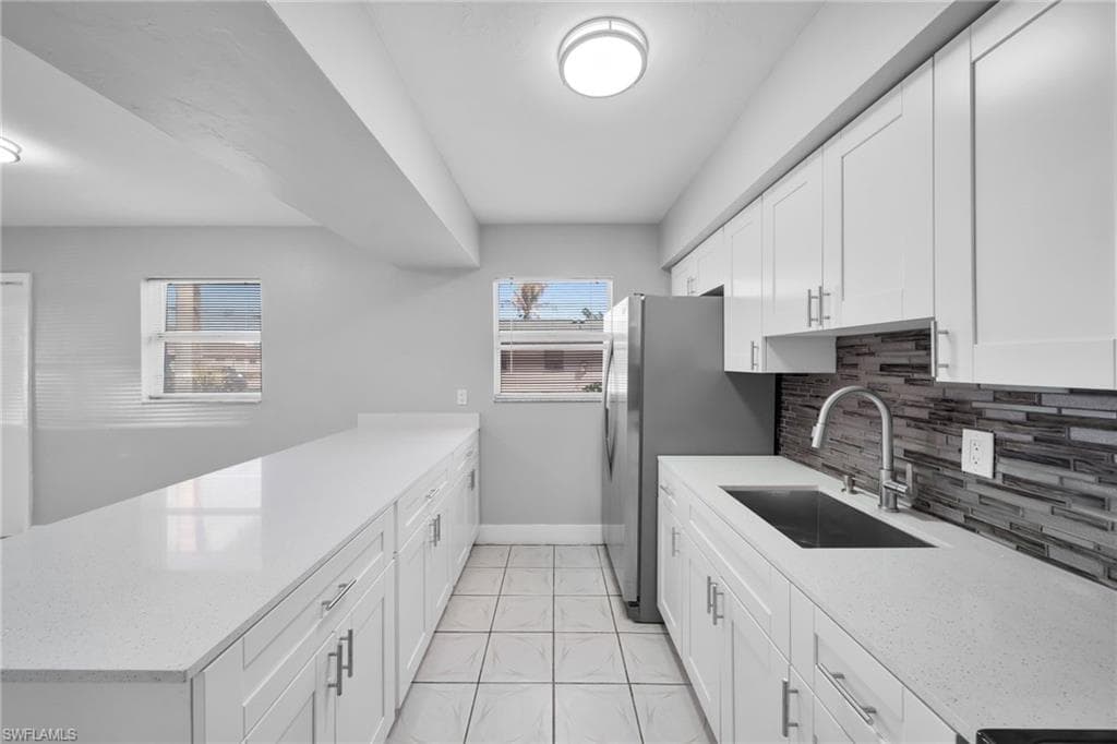 15 SE 24th AVE E CAPE CORAL, FL 33990