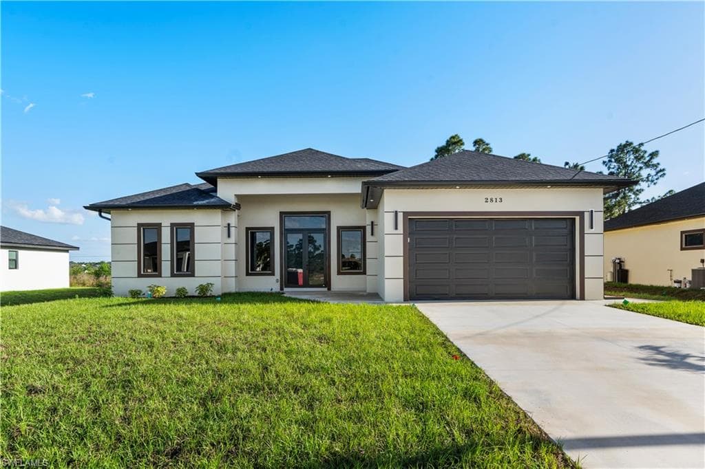 2813 19TH ST SW LEHIGH ACRES, FL 33976