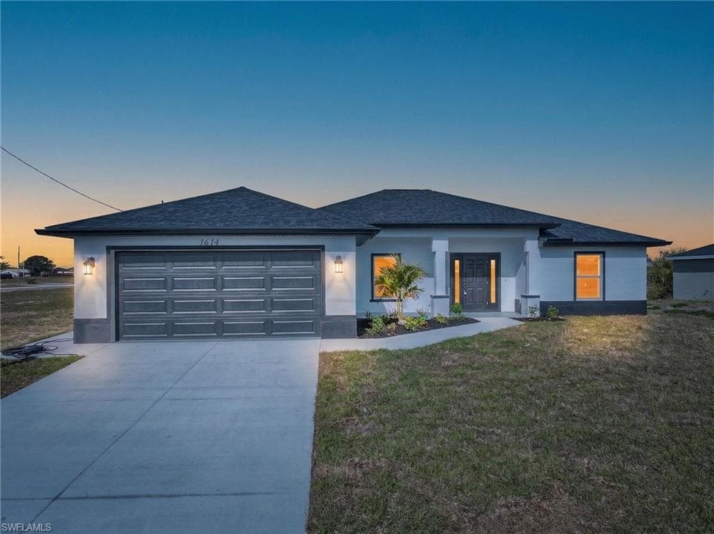 1614 NE 6th AVE CAPE CORAL, FL 33909