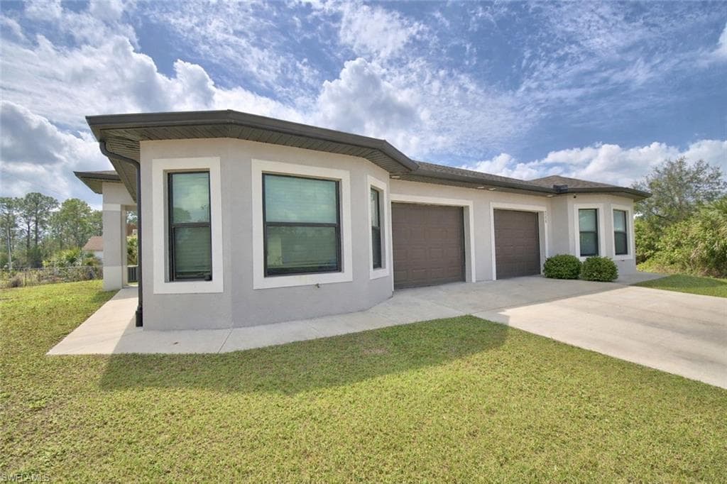 713/715 W 12th ST LEHIGH ACRES, FL 33972