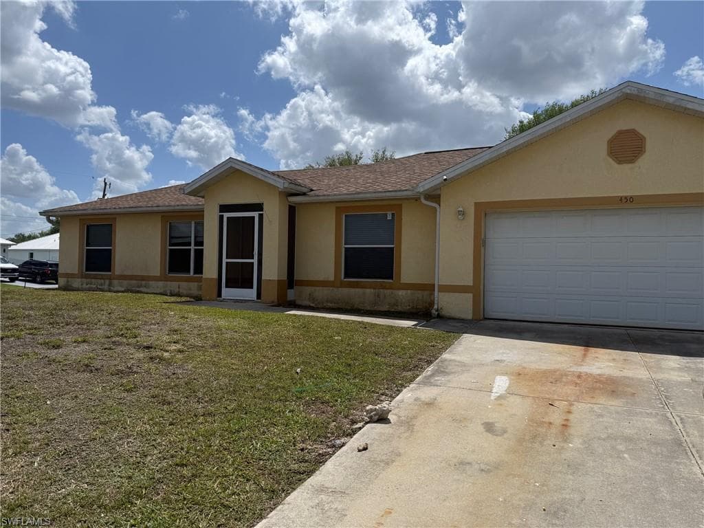 450 Rathburn ST LEHIGH ACRES, FL 33974
