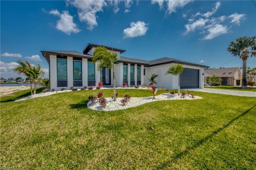 1715 SW 6th AVE CAPE CORAL, FL 33991