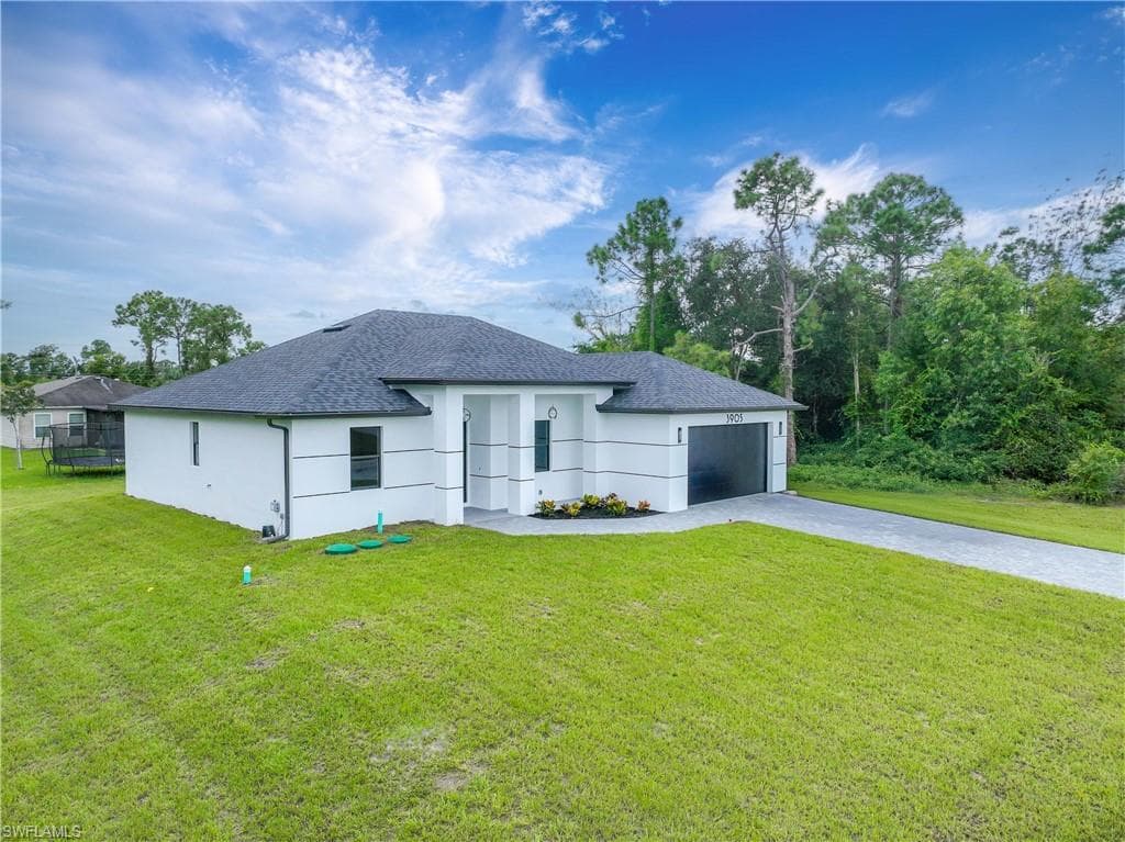 2619 23rd ST W LEHIGH ACRES, FL 33971
