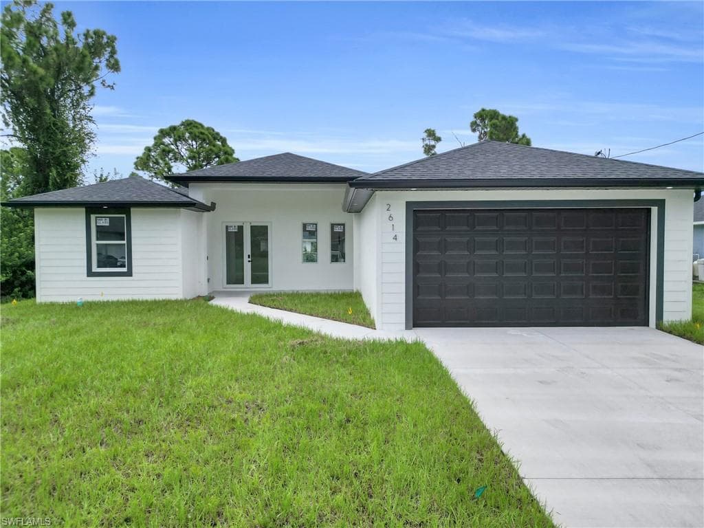2614 19th ST W LEHIGH ACRES, FL 33971