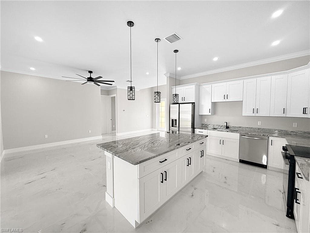 303 NW 26th AVE CAPE CORAL, FL 33993