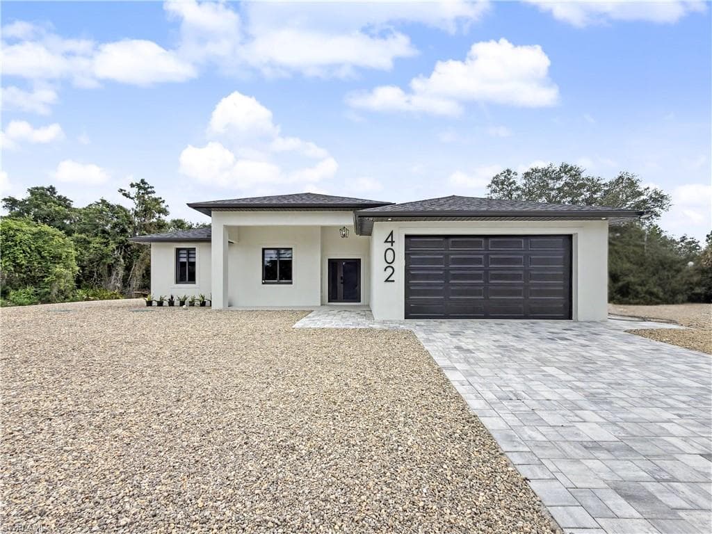 402 Thompson AVE LEHIGH ACRES, FL 33972