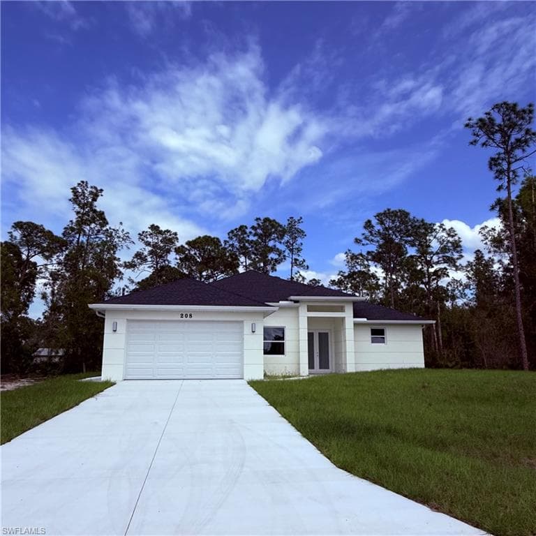 208 Johns AVE LEHIGH ACRES, FL 33936