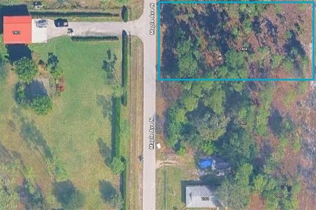 1404 Maple AVE N LEHIGH ACRES, FL 33972
