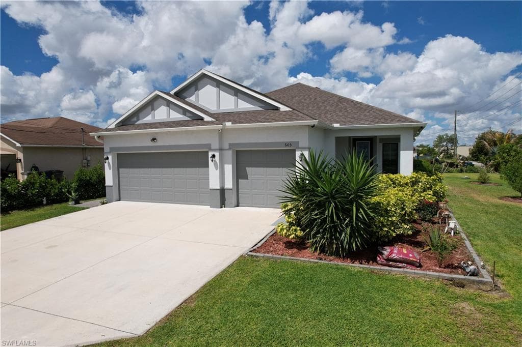 605 Norman AVE LEHIGH ACRES, FL 33971
