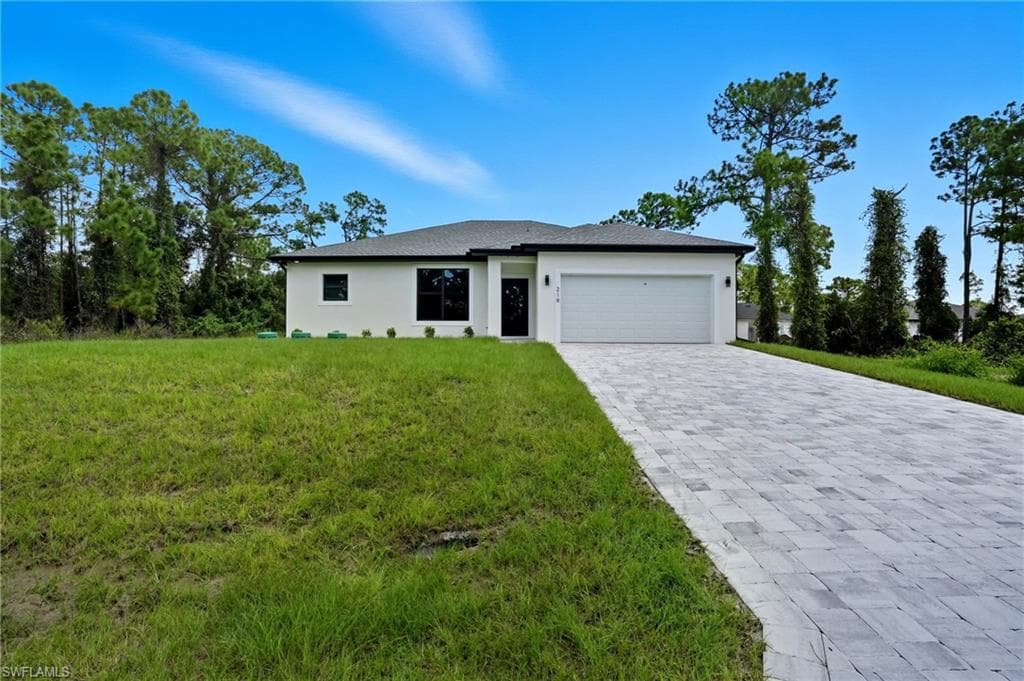 219 Ogden AVE S LEHIGH ACRES, FL 33974