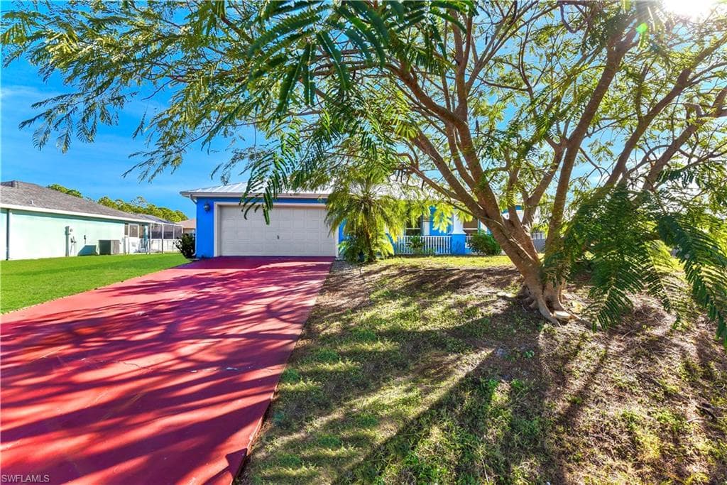 711 Downer AVE S LEHIGH ACRES, FL 33974