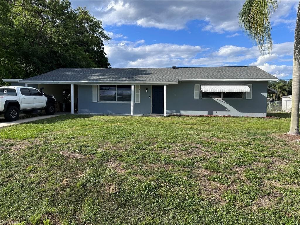 13 E Jasmine RD LEHIGH ACRES, FL 33936