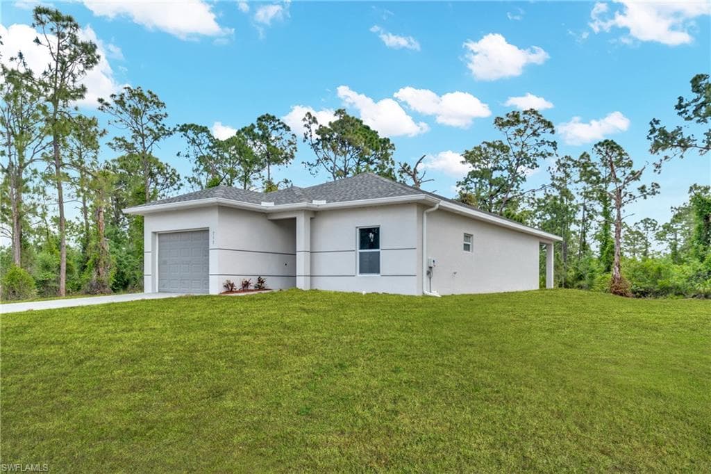 715 Bering AVE S LEHIGH ACRES, FL 33974