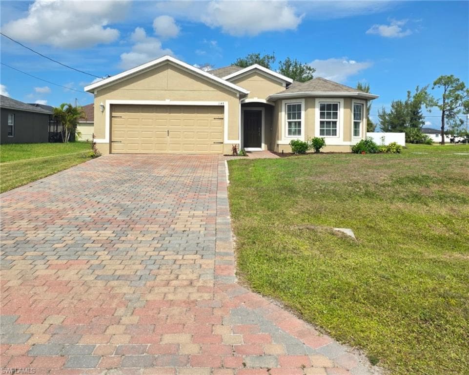 1148 NW 27th CT CAPE CORAL, FL 33993