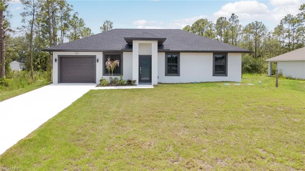 457 Woodman DR LEHIGH ACRES, FL 33972