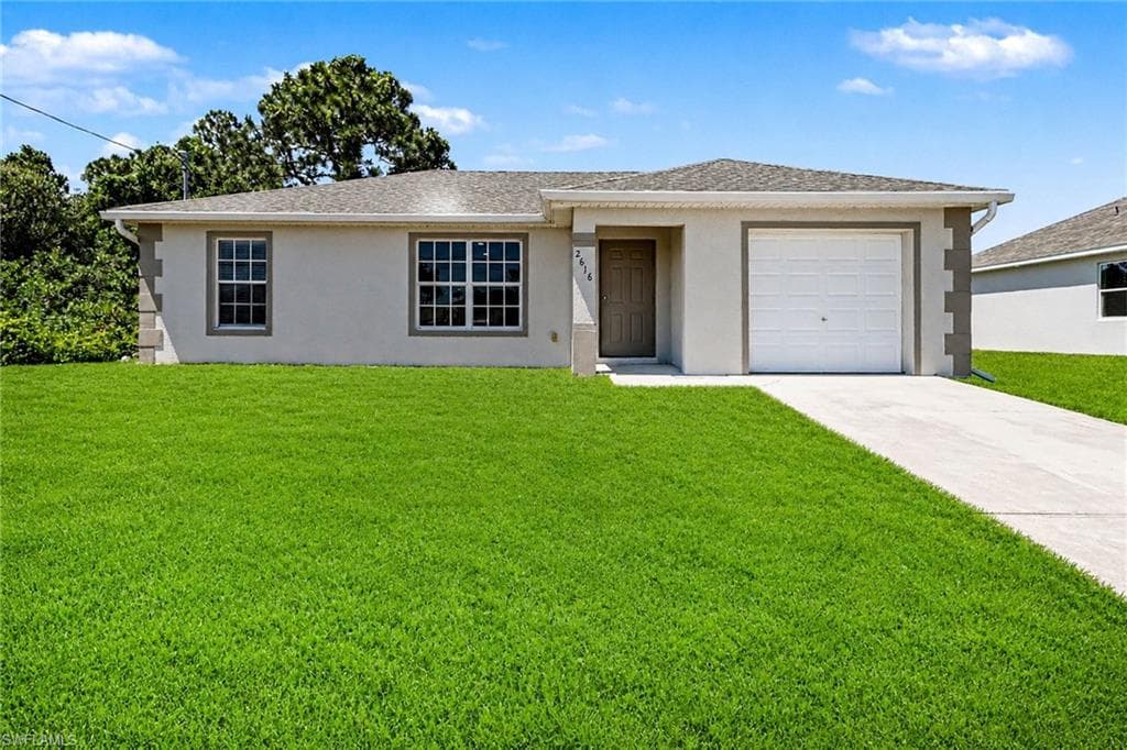 2616 14th ST SW LEHIGH ACRES, FL 33976
