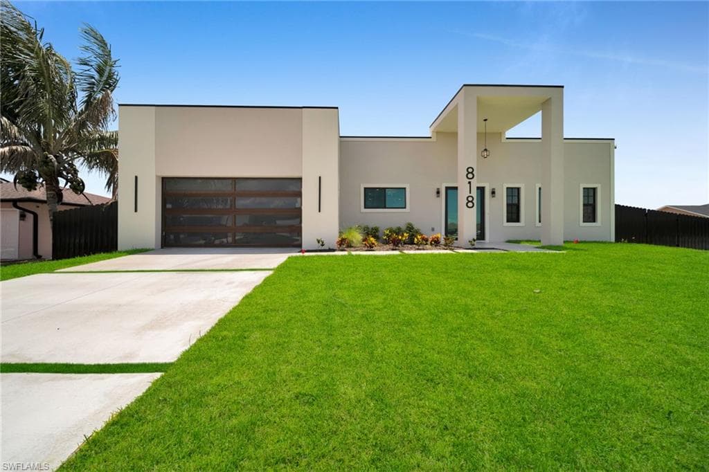 818 NE 10th ST CAPE CORAL, FL 33909