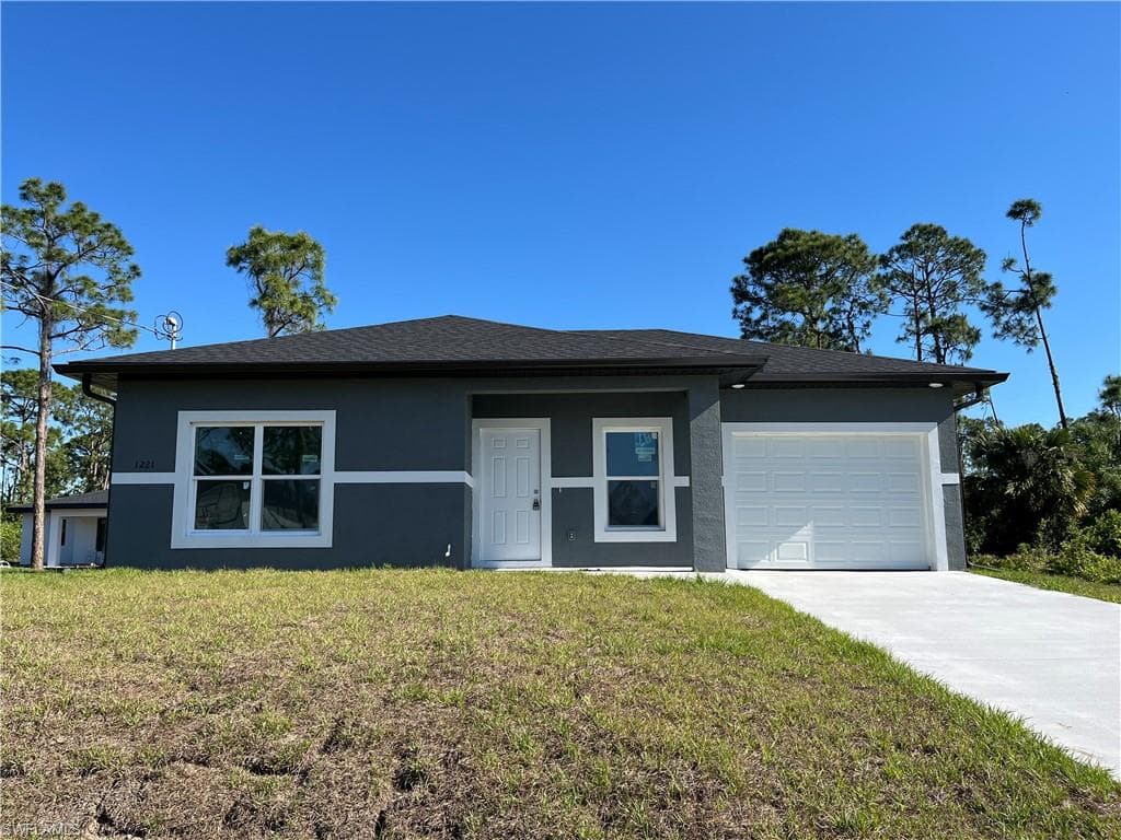 1221 Ecstasy ST E LEHIGH ACRES, FL 33974