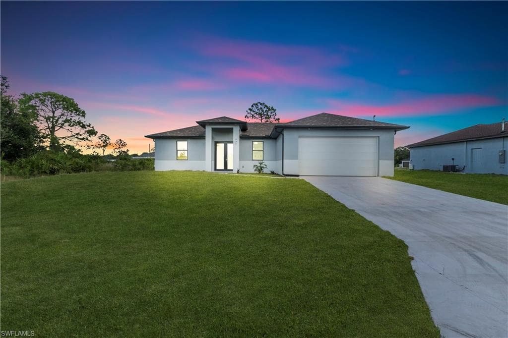 497 Lenox AVE LEHIGH ACRES, FL 33974
