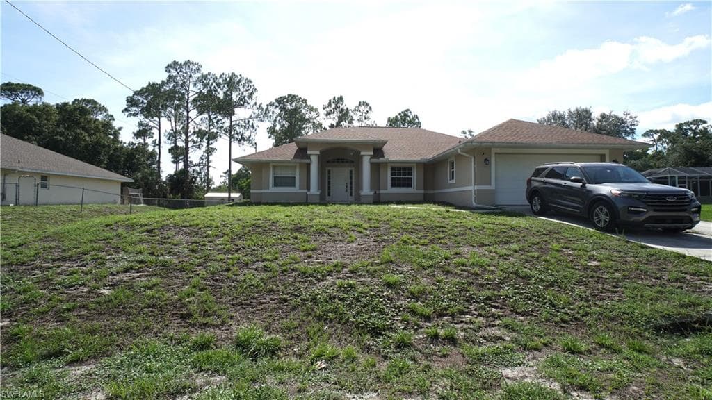 413 Truman AVE LEHIGH ACRES, FL 33972