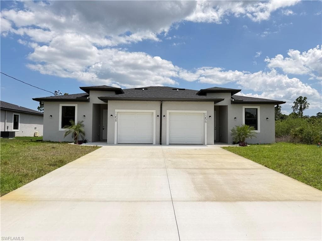 1256 MILWAUKEE BLVD LEHIGH ACRES, FL 33974