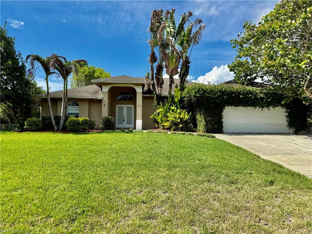 711 Sawyer ST LEHIGH ACRES, FL 33974