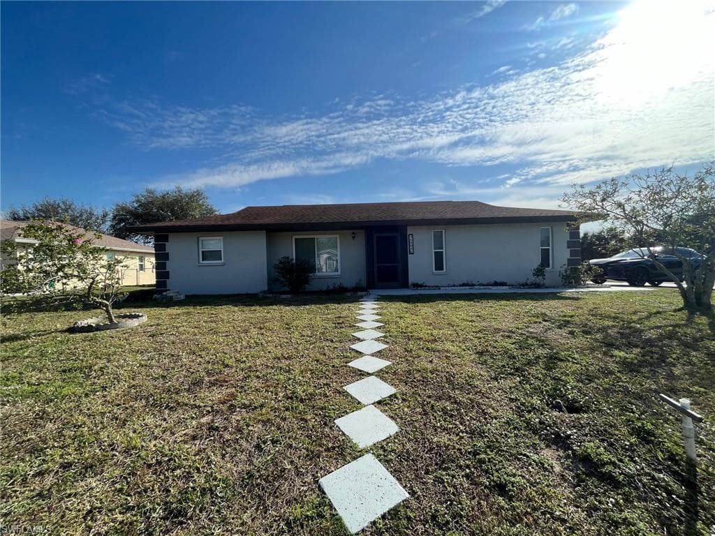 1402 SE 34 ST CAPE CORAL, FL 33904
