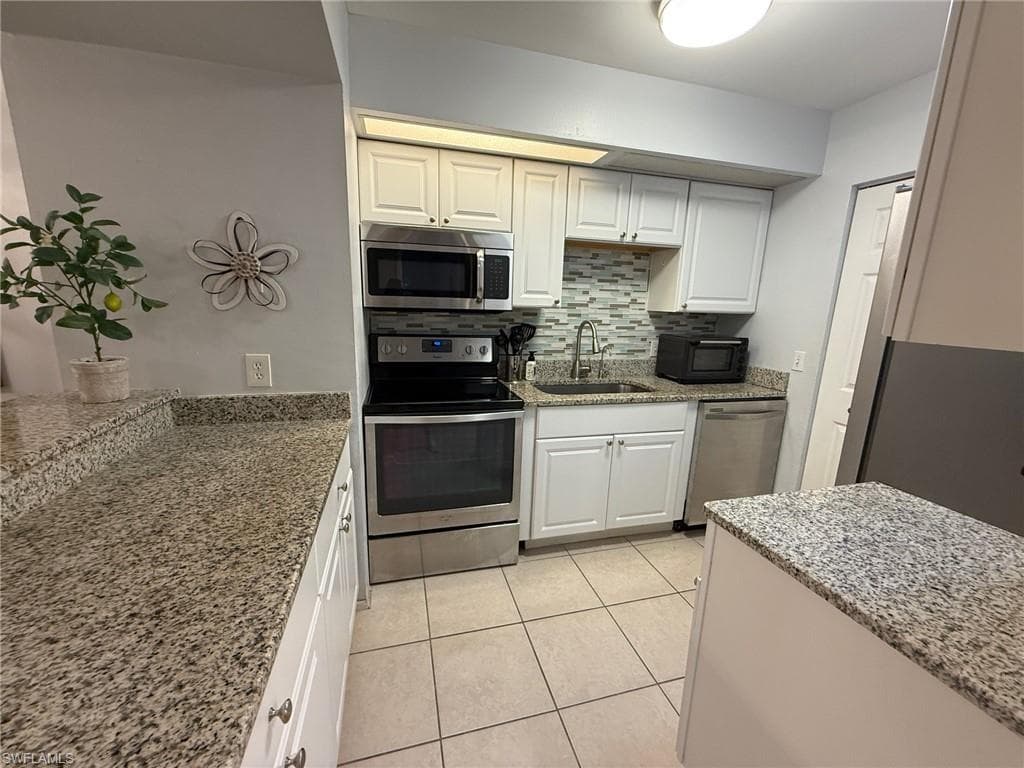14900 Summerlin Woods DR 13 FORT MYERS, FL 33919