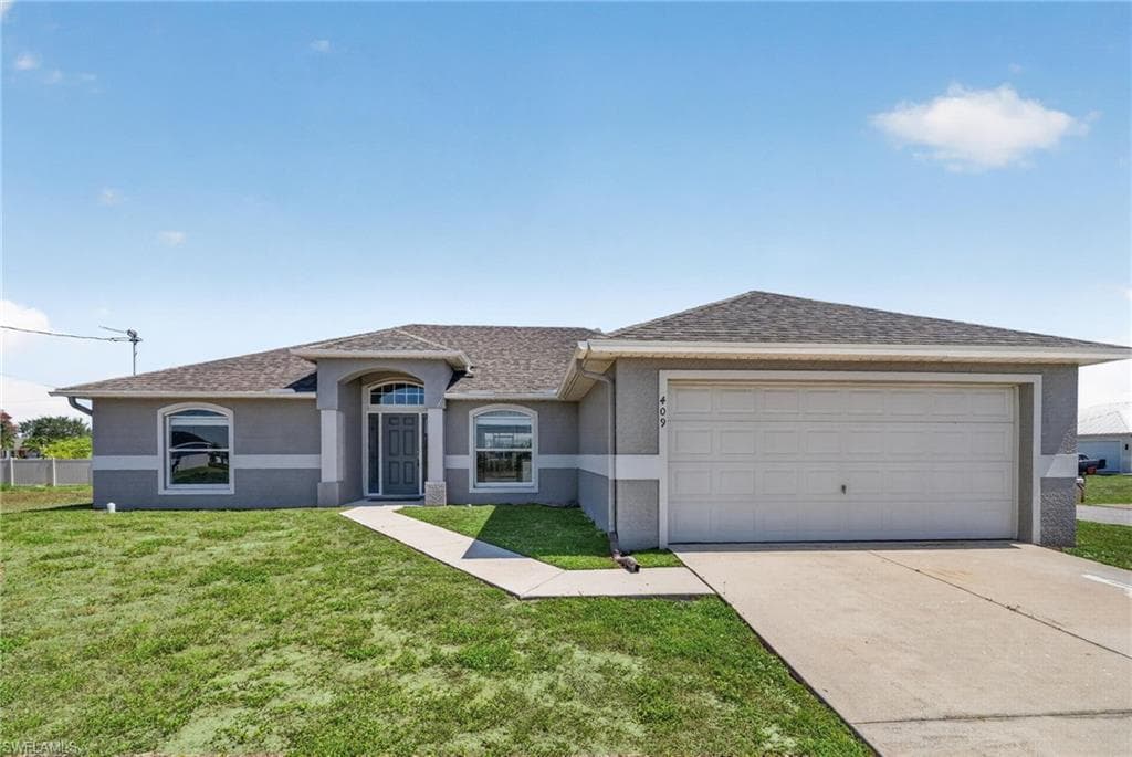409 NE 25th TER CAPE CORAL, FL 33909