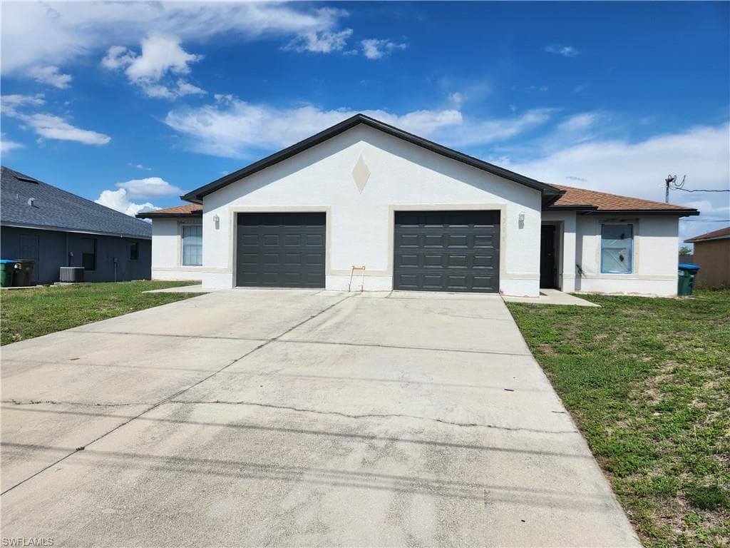 1309/1311 NE 8th PL CAPE CORAL, FL 33909