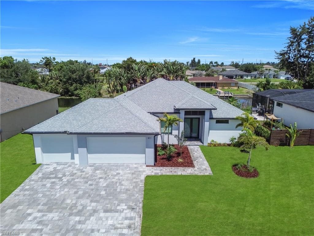411 SW 26th PL CAPE CORAL, FL 33991