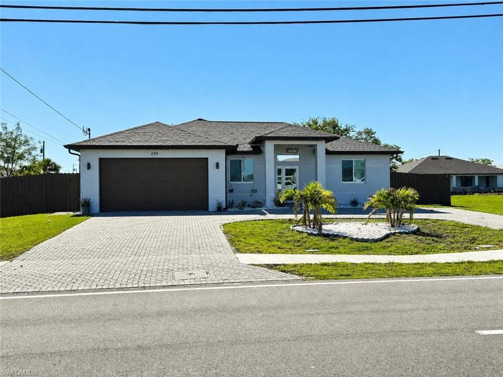 209 Nelson RD N CAPE CORAL, FL 33993