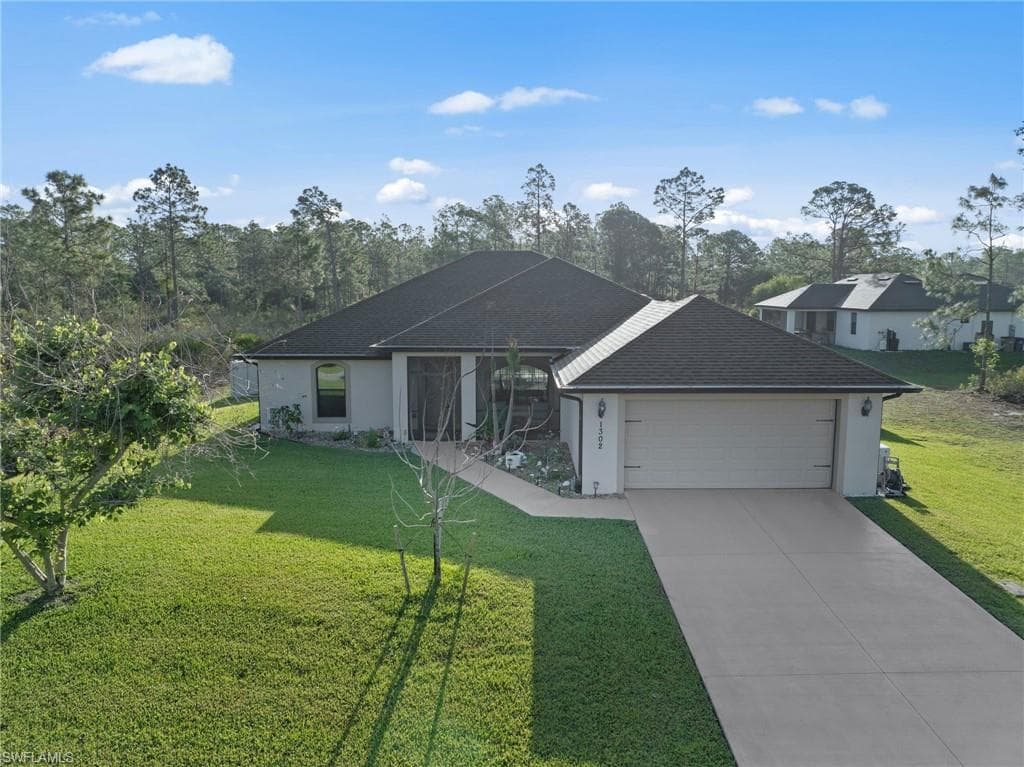 1302 Magnolia AVE LEHIGH ACRES, FL 33972