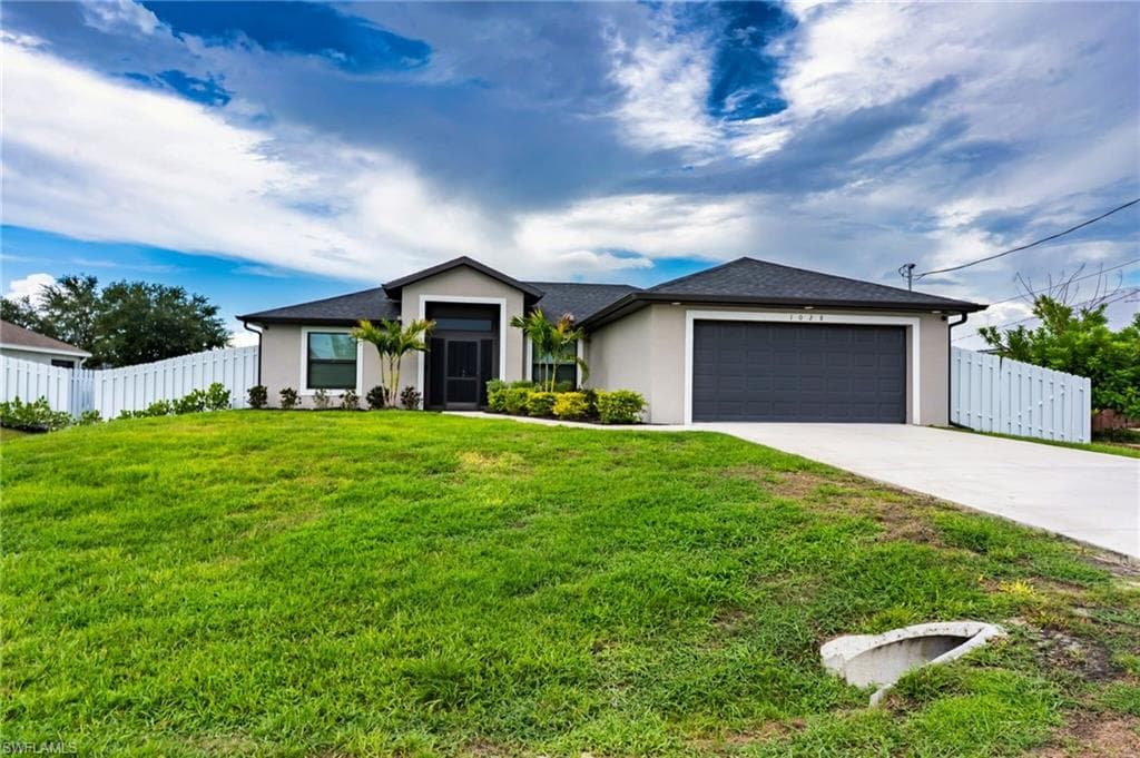 1028 Champion AVE LEHIGH ACRES, FL 33971