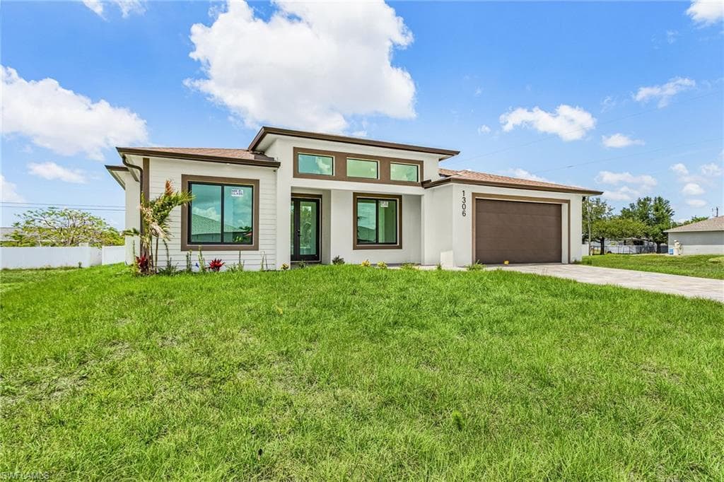 1306 NE 3rd AVE CAPE CORAL, FL 33909