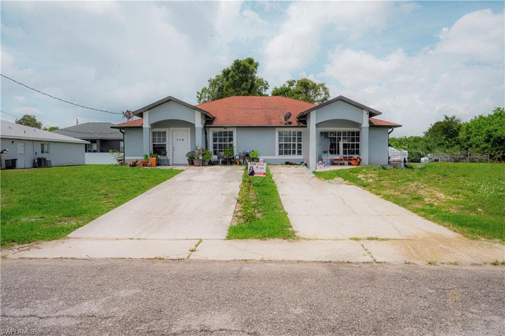 716-718 Ichabod AVE LEHIGH ACRES, FL 33973